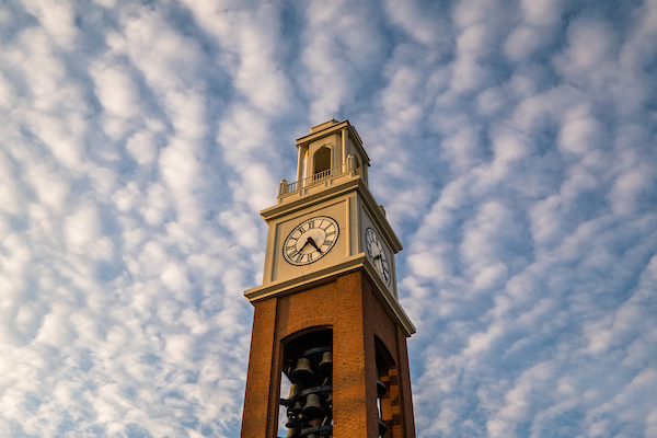 bell tower with a cloudy sky