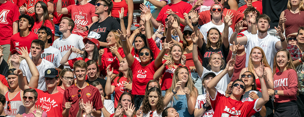 students in the stands at a game