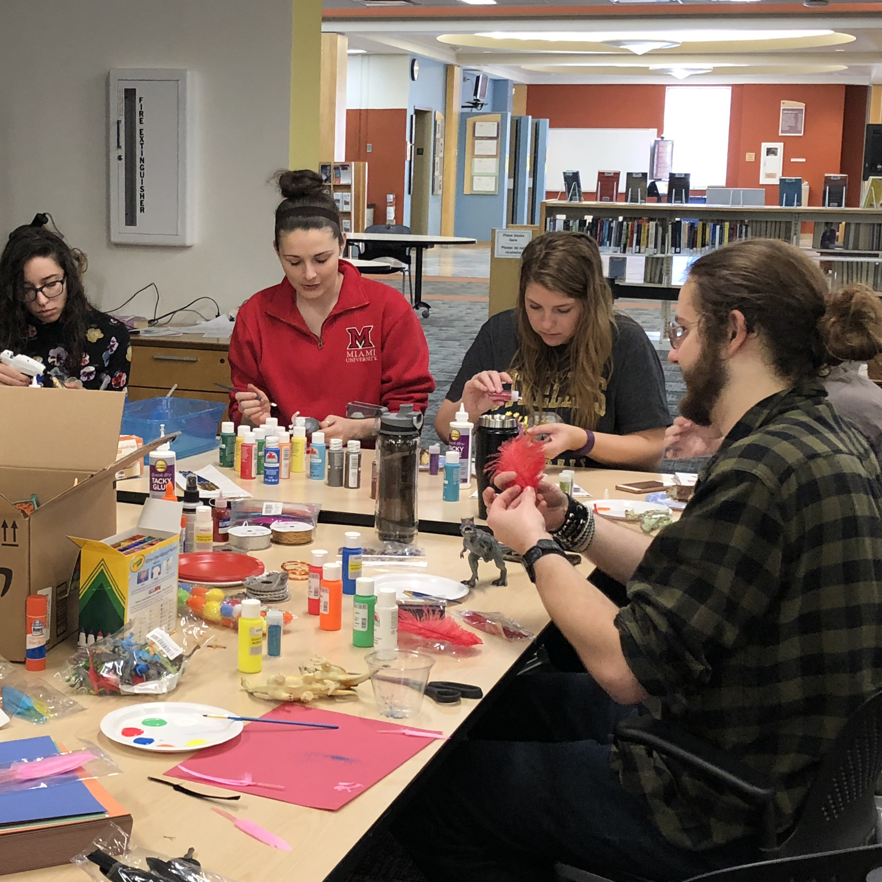 Participants craft at table.