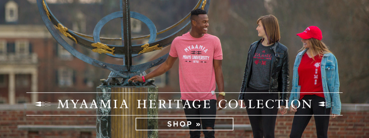 Myaamia Heritage Collection. Three students wearing heritage collection apparel stand by the sundial on central quad. Shop