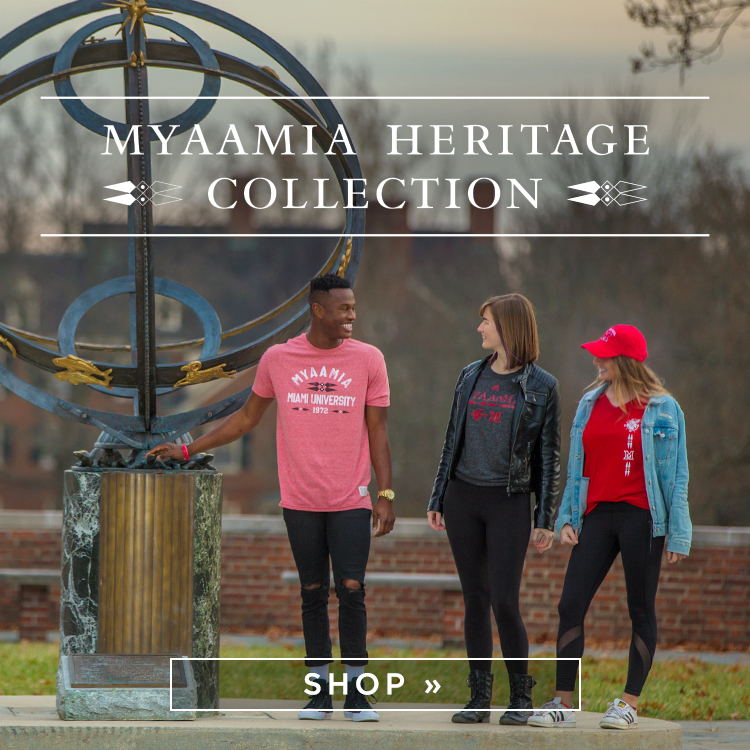 Myaamia Heritage Collection. Three students wearing heritage collection apparel stand by the sundial on central quad. Shop
