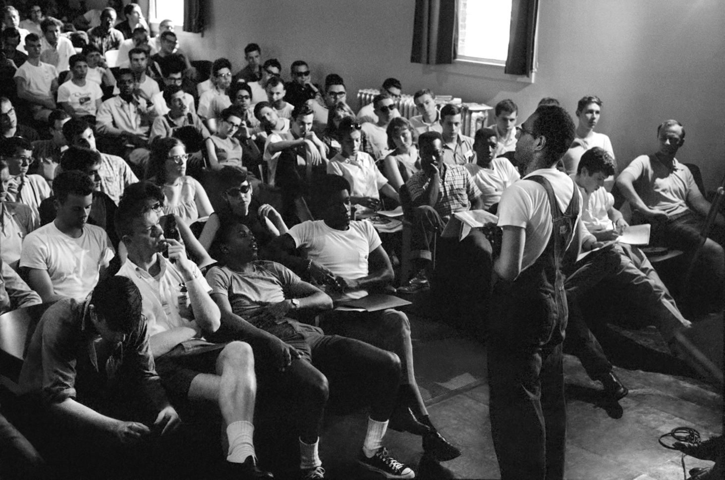 Freedom Summer organizer Bob Moses talks to volunteers at an orientation in Peabody Hall
