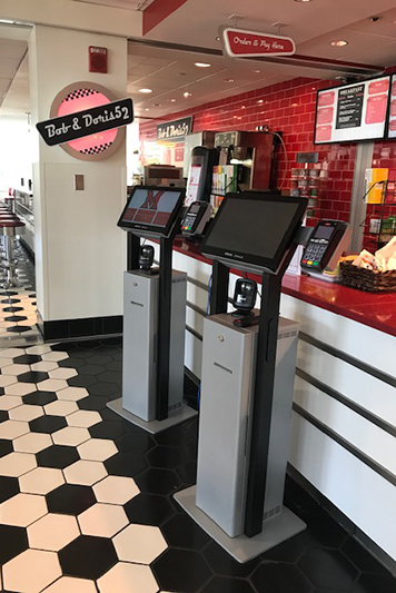 Two ordering kiosks at the Pulley Diner