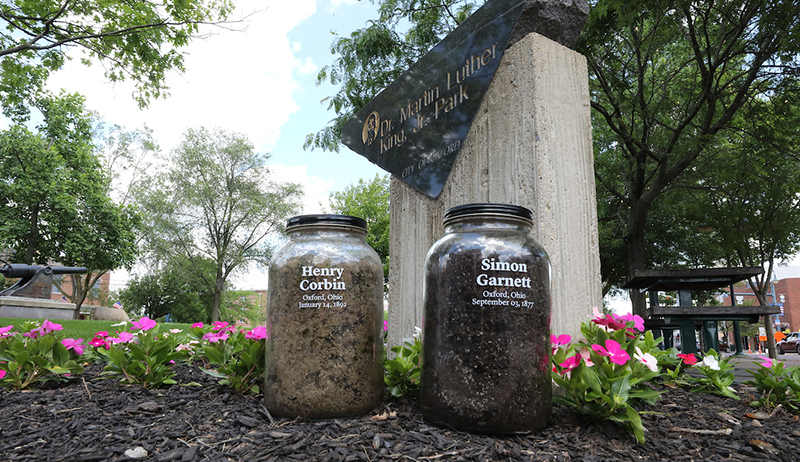 Soil collected in 2019 from the lynching sites join jars from across the nation at the Equal Justice Initiative's Legacy Museum in Alabama. Note: Research discovered two differeent , spellings for one victim's name. It was later determined that the correct spelling is Simeon Garnet. 