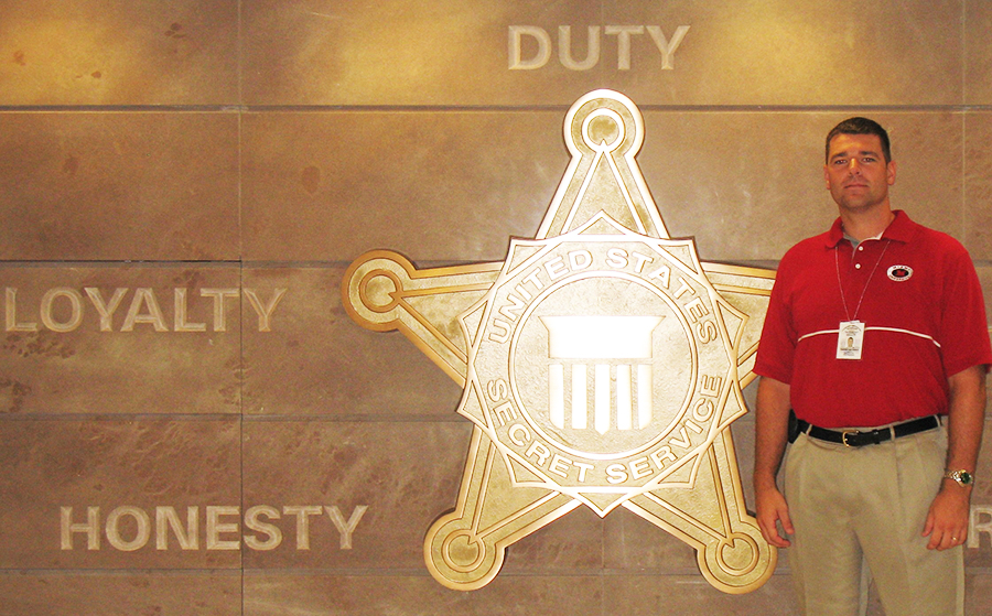 steve vanwinkle in front of secret service insignia 