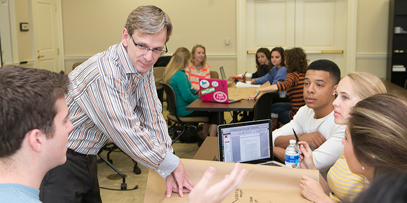 Photo of students in a classroom setting.