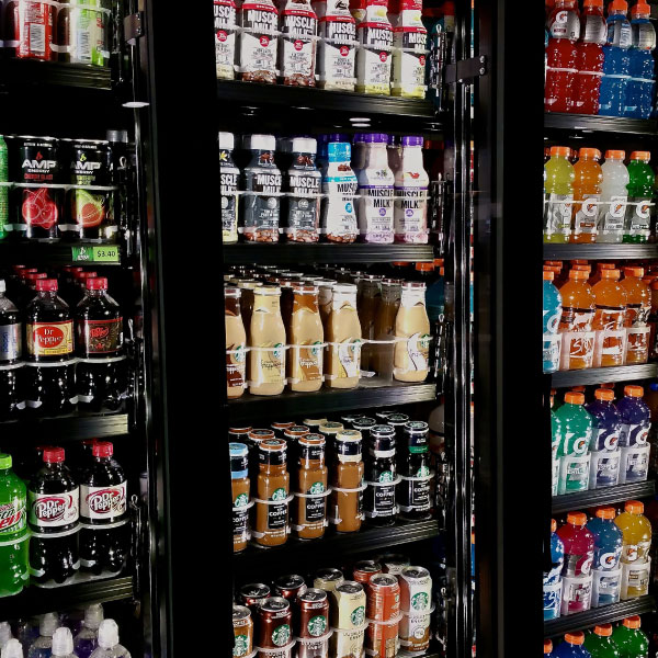 A refrigerator of drinks at Scoreboard Market