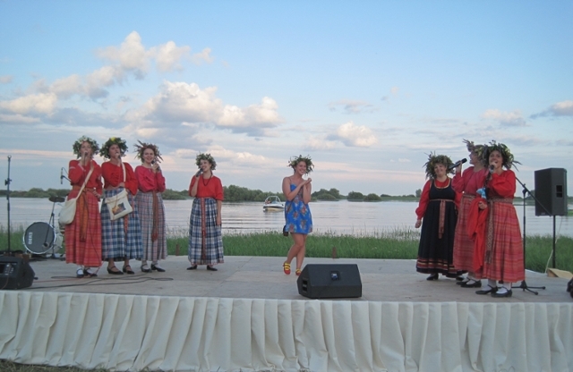 Students dancing on stage in festival