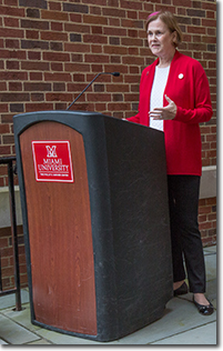 photo of Sue J. Henry speaking at the naming ceremony