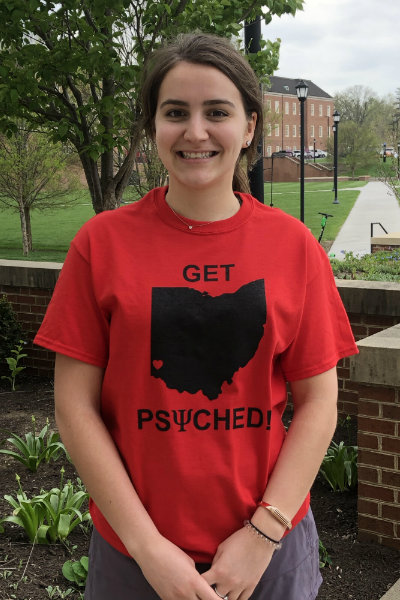Student wearing the Get Psyched shirt, front image