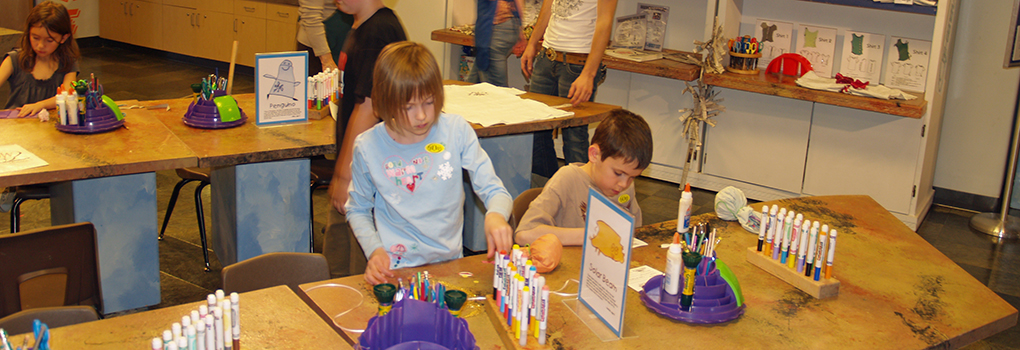 An adult and child interact in Buell Children's Museum Art Room