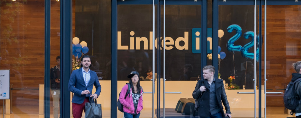 Workers walking out of the LinkedIn building in San Francisco