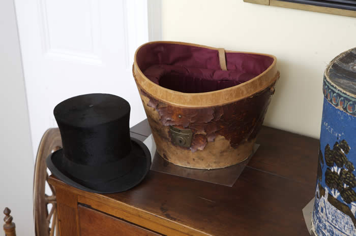 Peter Bruner Hat Box next to a top hat