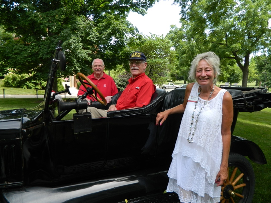 Diana Royer, John Clover, and George Beverley with a Model T car
