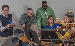 Three professors from different disciplines come together to study music, movement and pain.