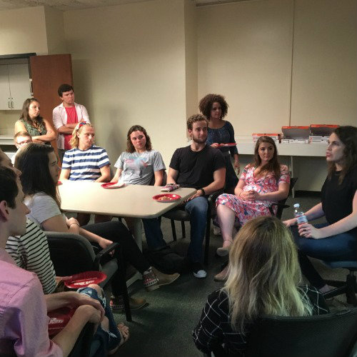 Beth Stelling talking to a room full of students