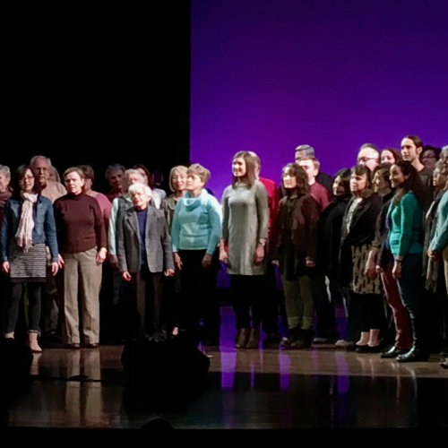 Community Chorus singing on stage