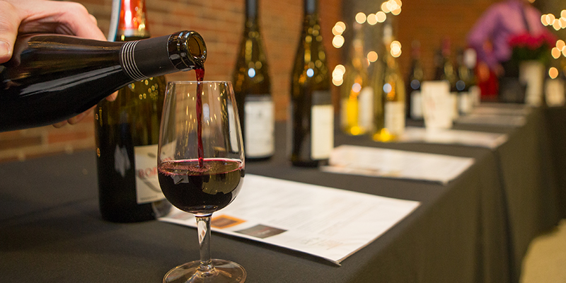 Wine being poured into a glass