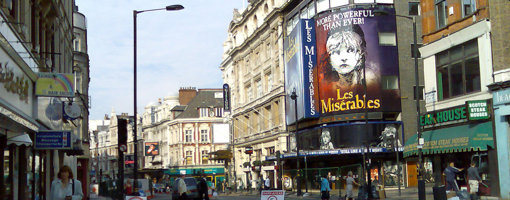 The street in London's West End Theatre district, with a marquee for Les Miserables visible