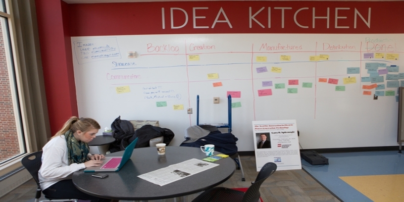 A female student studies in the Idea Kitchen in the Lockheed Martin Leadership Institute