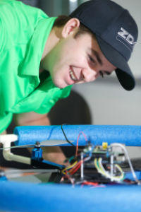 Male student working on a quadcopter