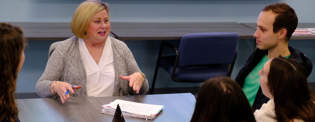Professor meets with students