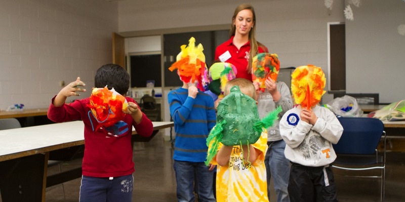 kids play with masks on their faces