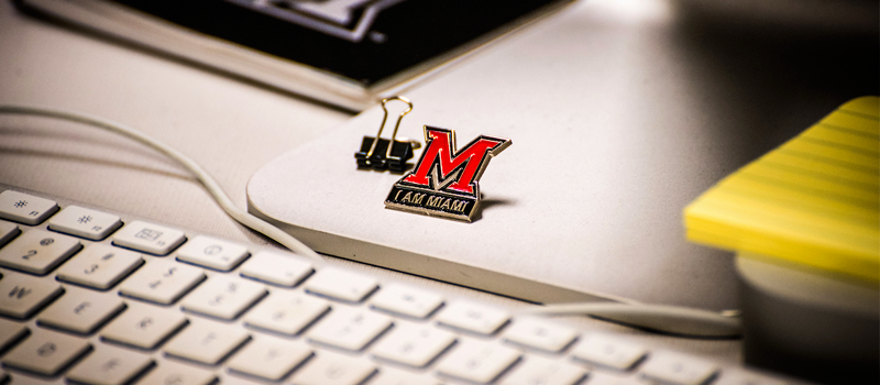 miami logo magnet attached to a computer