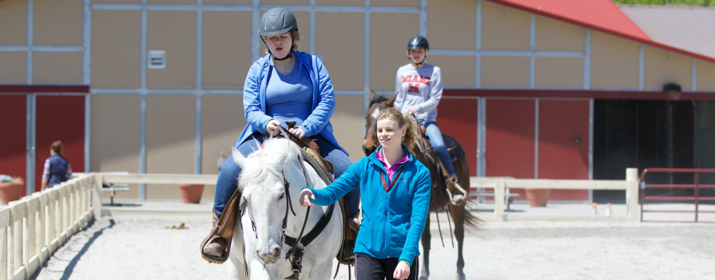  students riding horses