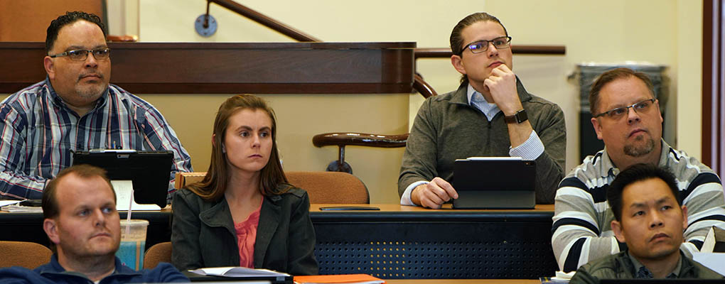 Students listen to lecture in class