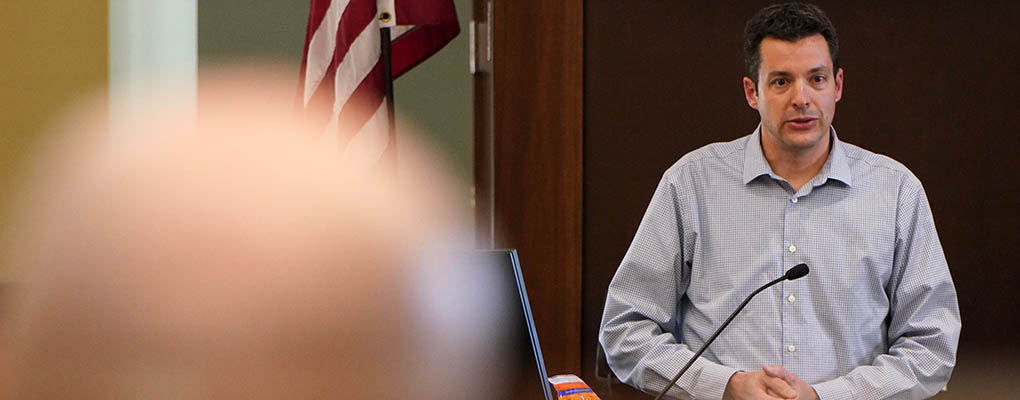 Student makes presentation in MBA class