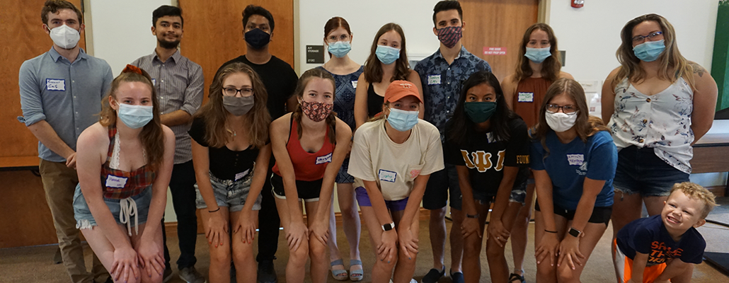  Masked CAS cohort poses in MacMillan Hall