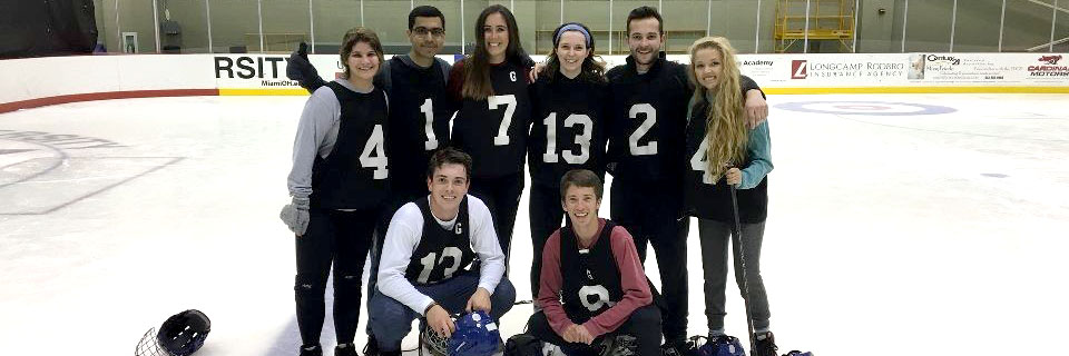Pranshu and his broomball team after winning the championship game.