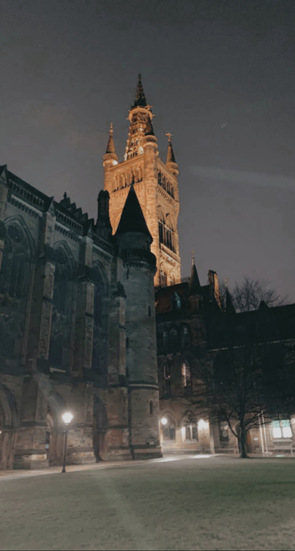 Nighttime view of University of Glasgow buildings