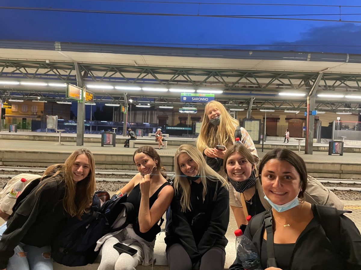 Mary and friends at a train station in Italy