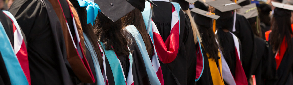  Master student hoods during commencement