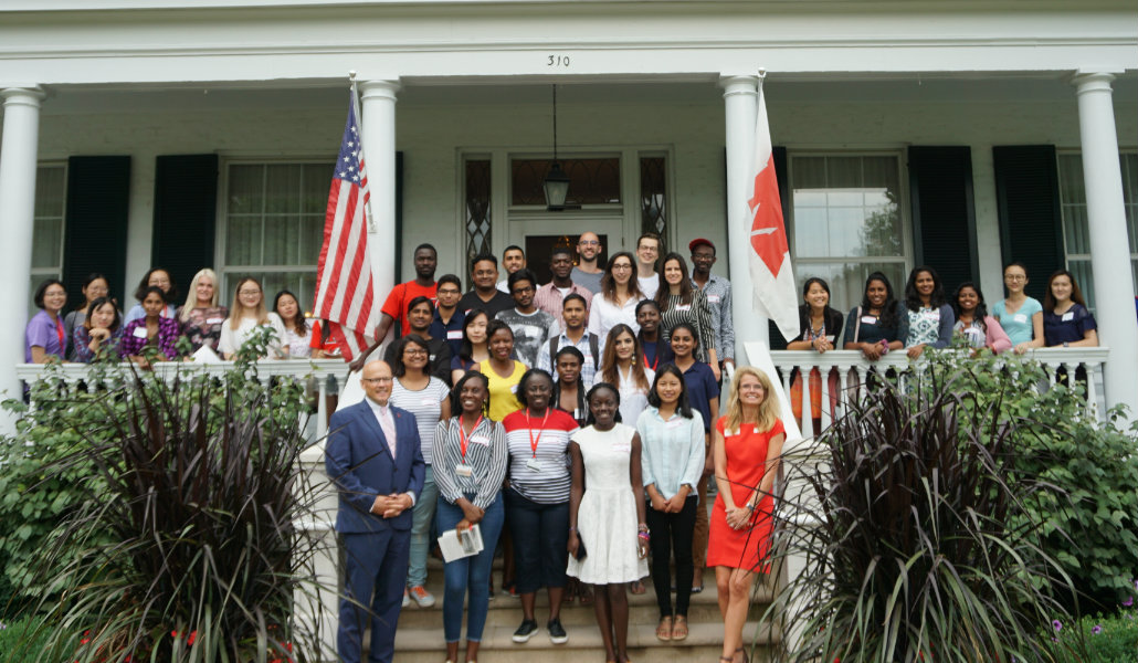  Group of new international graduate students in front of President Crawford's house with both Crawfords