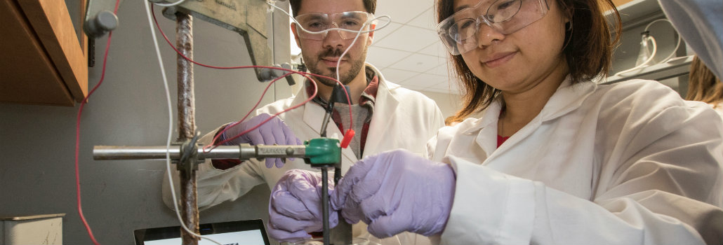  Two students working together in a lab