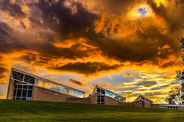 Art Museum at sunset with orange sky