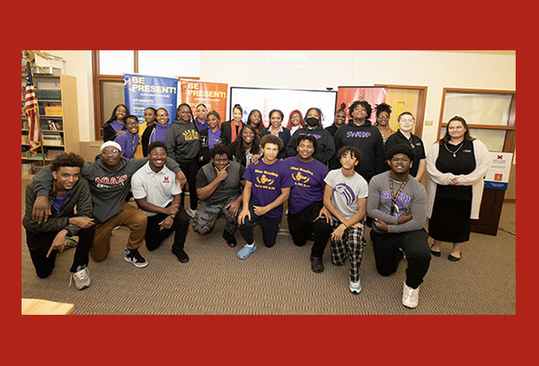 TEACh Cincinnati group of students and CPS administrators in Aiken high school