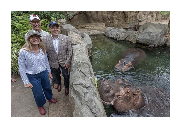Renate Crawford, Thane Maynard, Greg Crawford, and Fiona the hippo