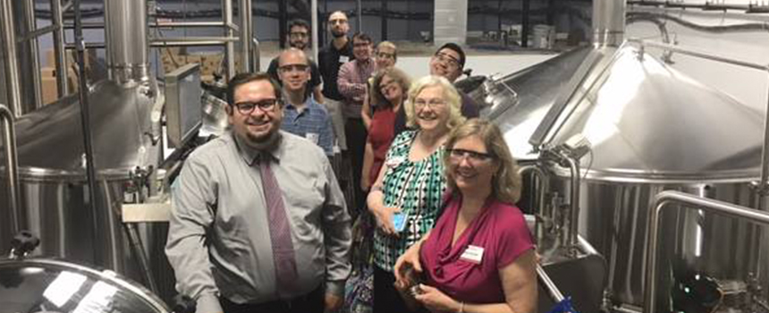 An alumni group event during a brewery tour.