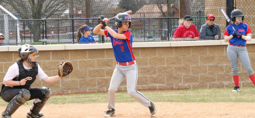 Miami Middletown softball team at bat