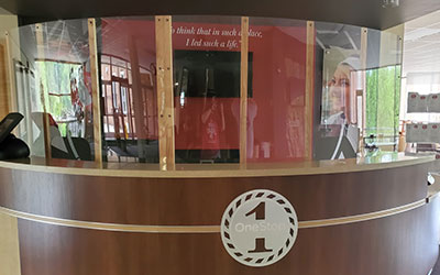 One Stop checkin desk at Middletown with plexiglass.