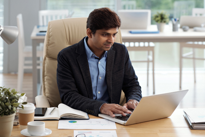 man working on a laptop