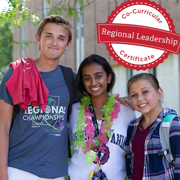  3 students standing with their arms around one another in the quad on the Middletown campus. Regional Leadership Certificate Program Logo.