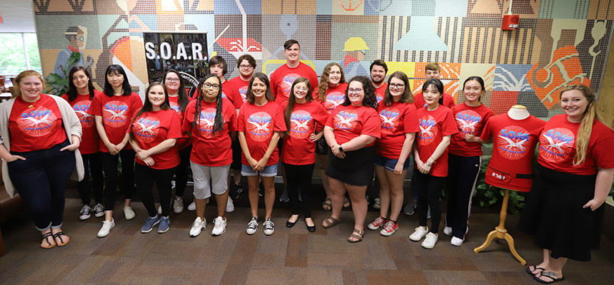  The Summer 2019 Orientation Staff standing in a line. 