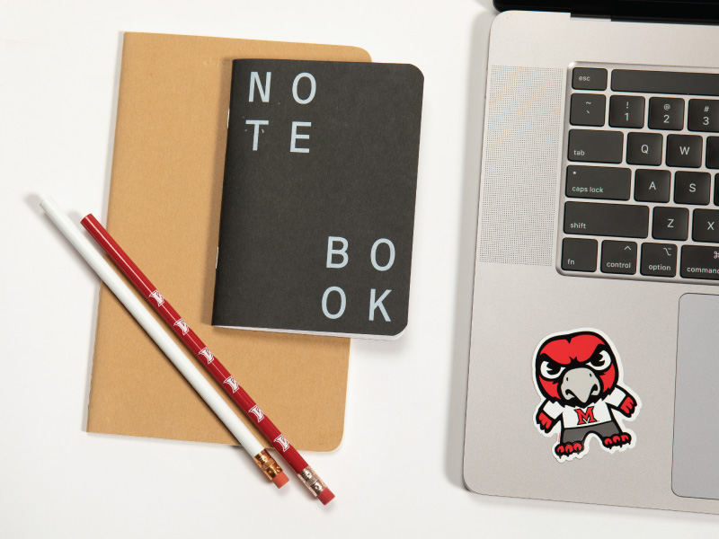 Notebook, laptop and pencil