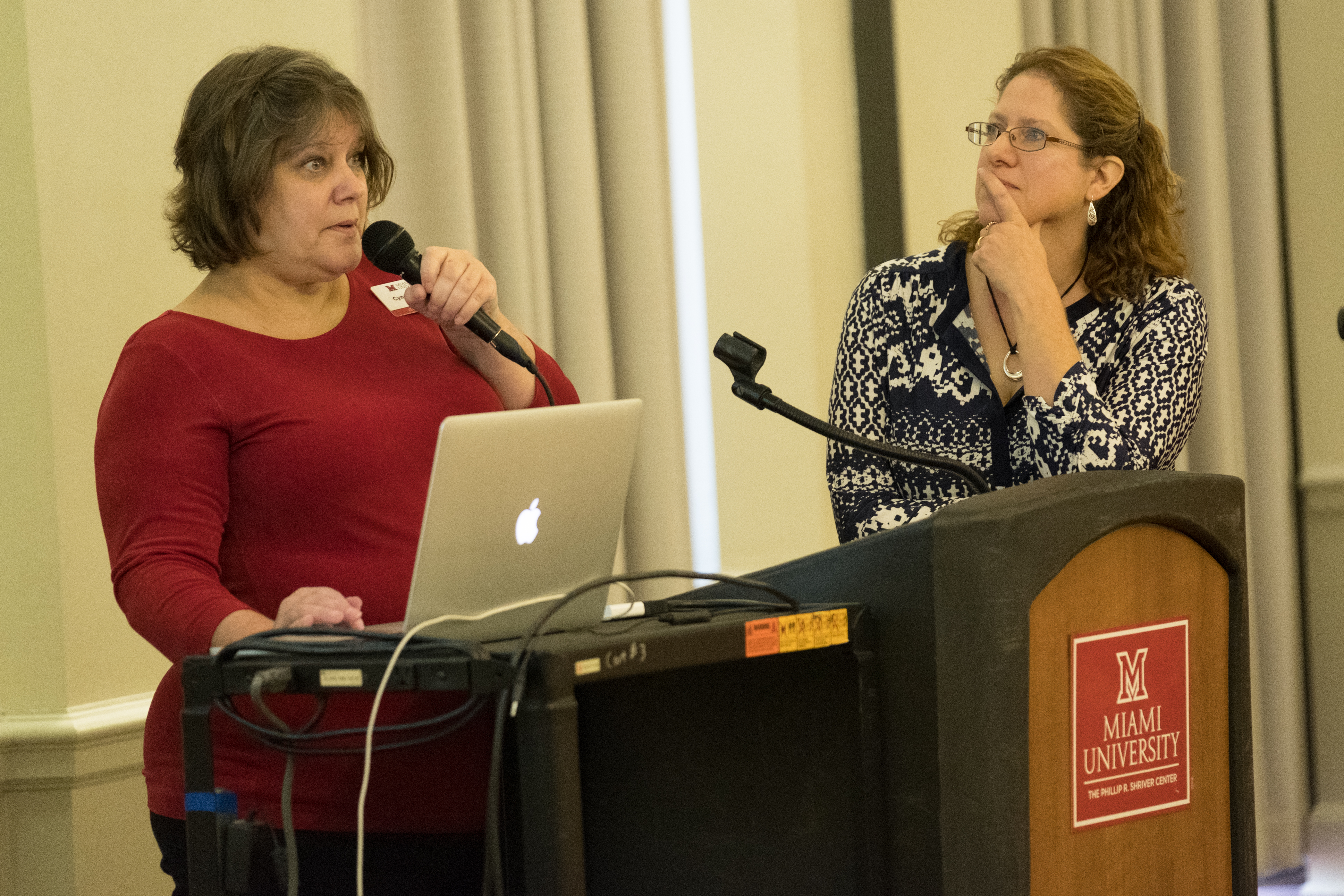 Cyndi Govreau and Elizabeth Farrar present at the AT Symposium.