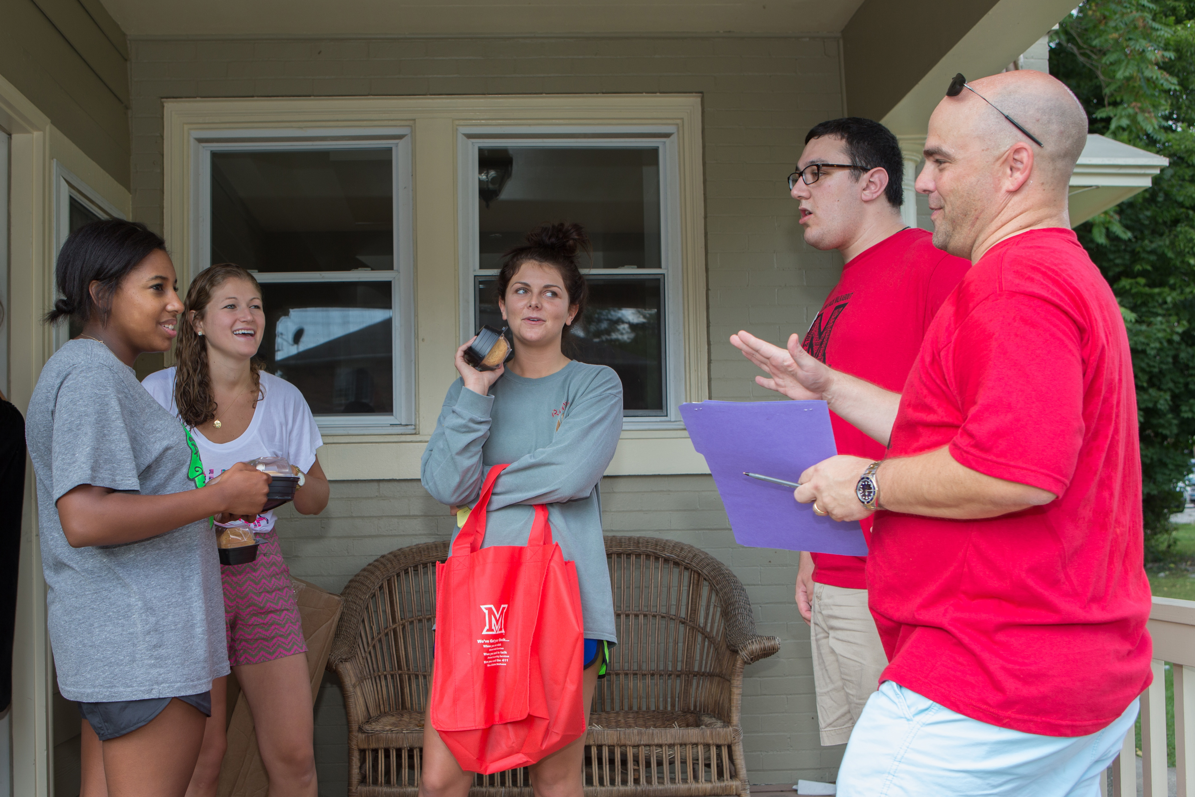  Two students doing door to door polling